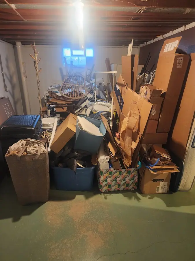 Roll-off dumpster container at job site for Yard Waste Dumpster Rental in Miami Heights